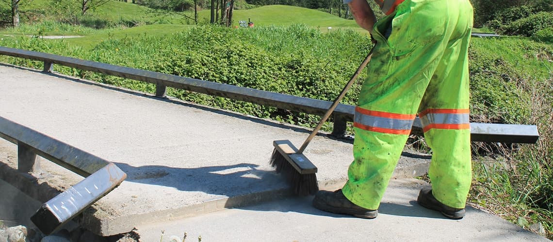 Compacting EZ Street Asphalt on golf course path