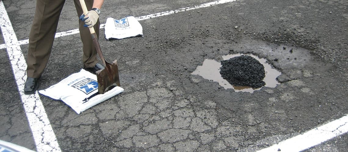EZ Street pothole repair at parking lot