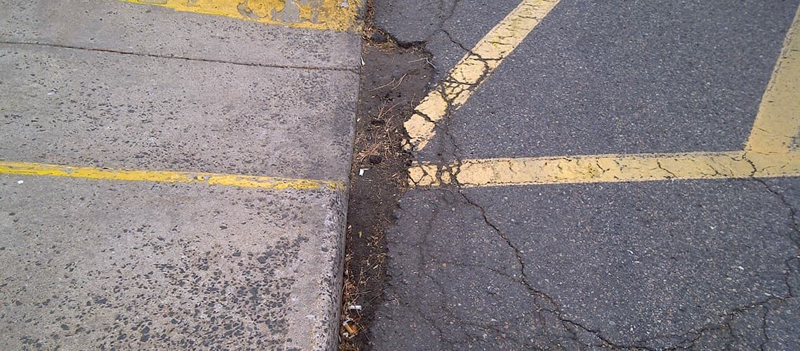Iliff Commons parking lot repair — before